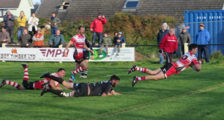 Evan Morgan dives over for a try for Milford Haven